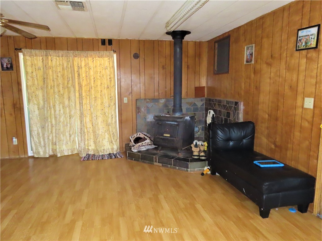 347 West Curlew Lake Road Republic, WA 99166 - Photo 8 of 26 a room with a bed and furniture