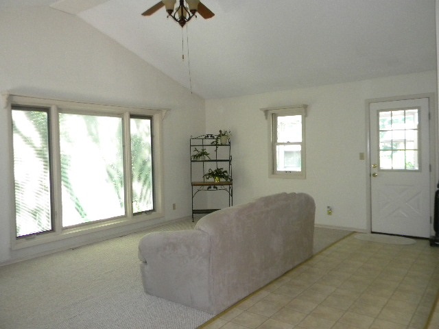 14049 South Bluff Road Rockton, IL 61072 - Photo 11 of 25 a living room with furniture and a large window