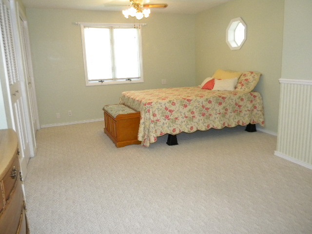14049 South Bluff Road Rockton, IL 61072 - Photo 13 of 25 a bedroom with bed and window