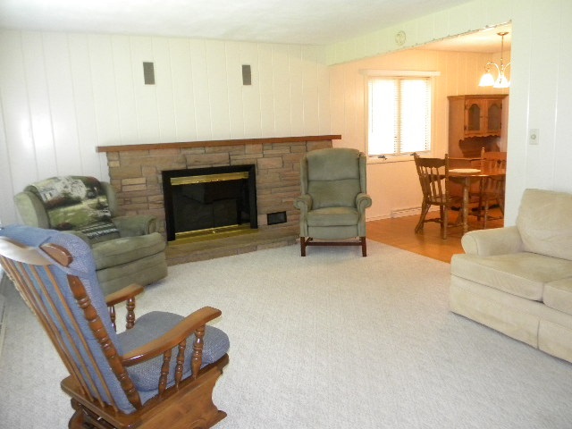 14049 South Bluff Road Rockton, IL 61072 - Photo 4 of 25 a living room with furniture and a fireplace