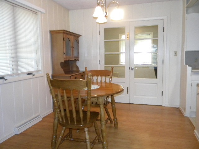 14049 South Bluff Road Rockton, IL 61072 - Photo 5 of 25 a view of a dining room with furniture and window