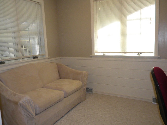 14049 South Bluff Road Rockton, IL 61072 - Photo 6 of 25 a living room with furniture and a window