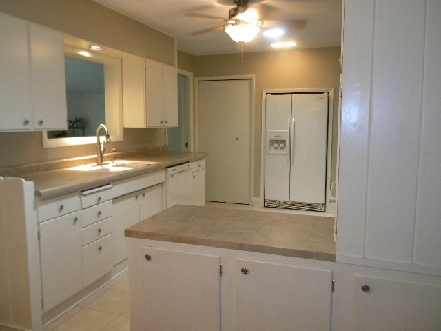 14049 South Bluff Road Rockton, IL 61072 - Photo 10 of 25 a view of a granite countertop cabinets