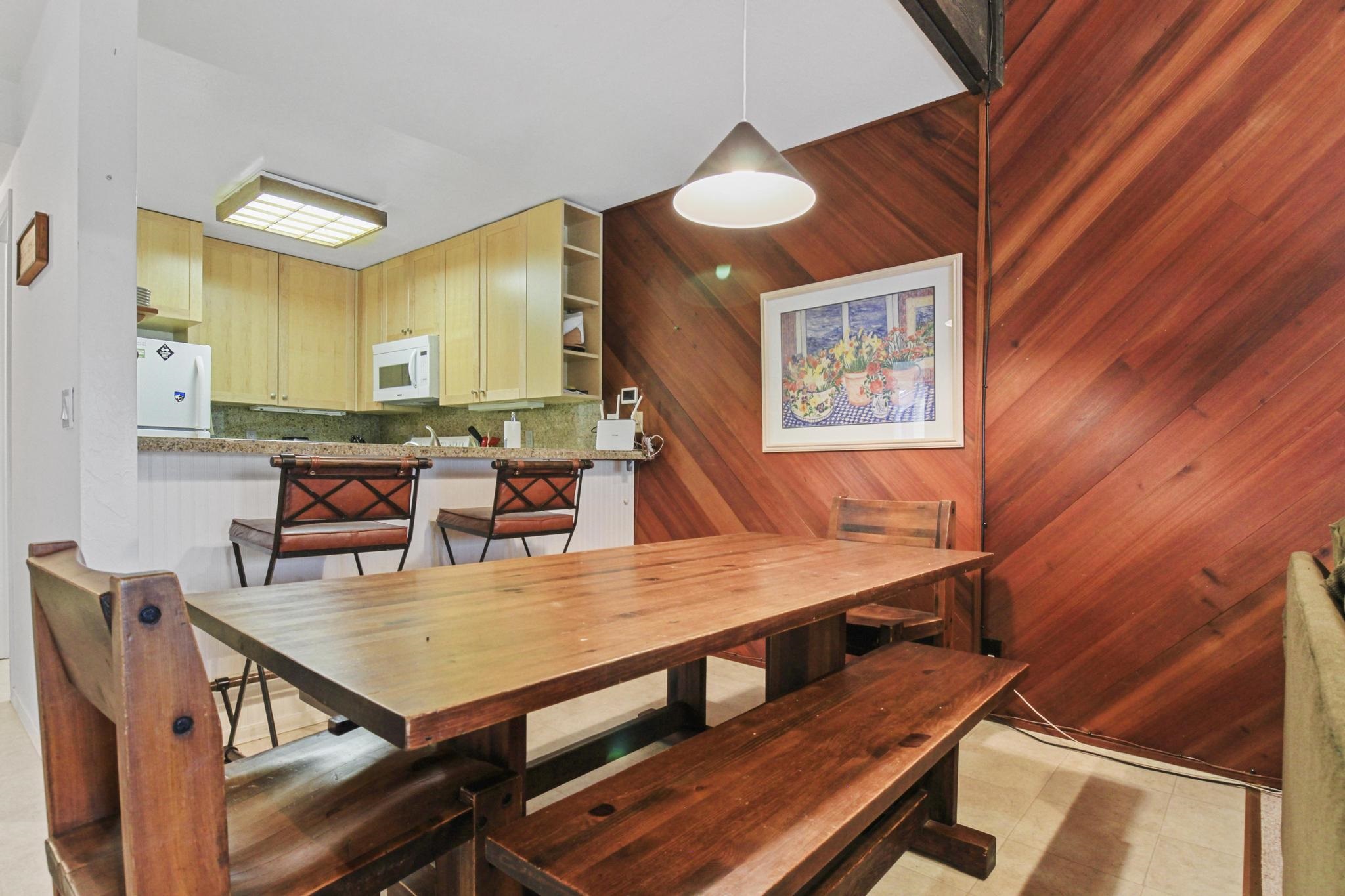 2090 Chalet Road, Unit 2 Alpine Meadows, CA 96146 - Photo 11 of 23 a dining room with furniture and wooden floor
