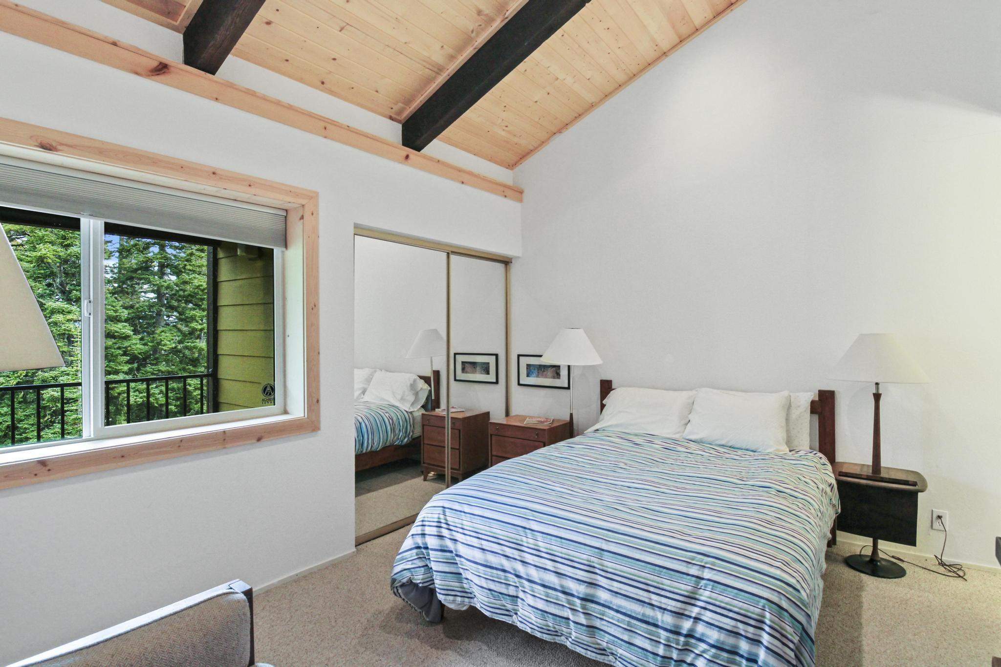 2090 Chalet Road, Unit 2 Alpine Meadows, CA 96146 - Photo 13 of 23 a bedroom with a bed and a window