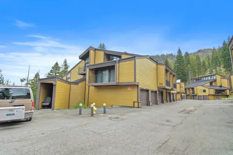 a view of a house with a street
