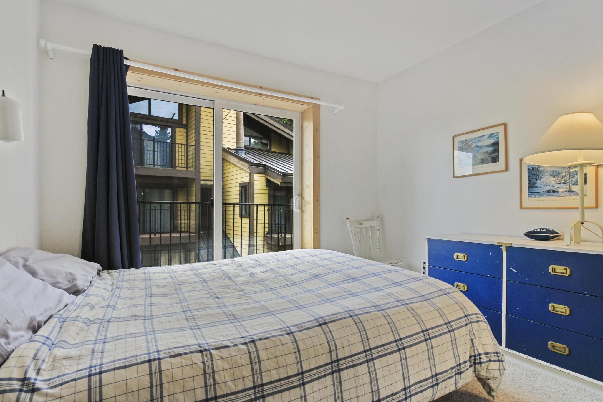 2090 Chalet Road, Unit 2 Alpine Meadows, CA 96146 - Photo 6 of 23 a bedroom with a bed and a dresser