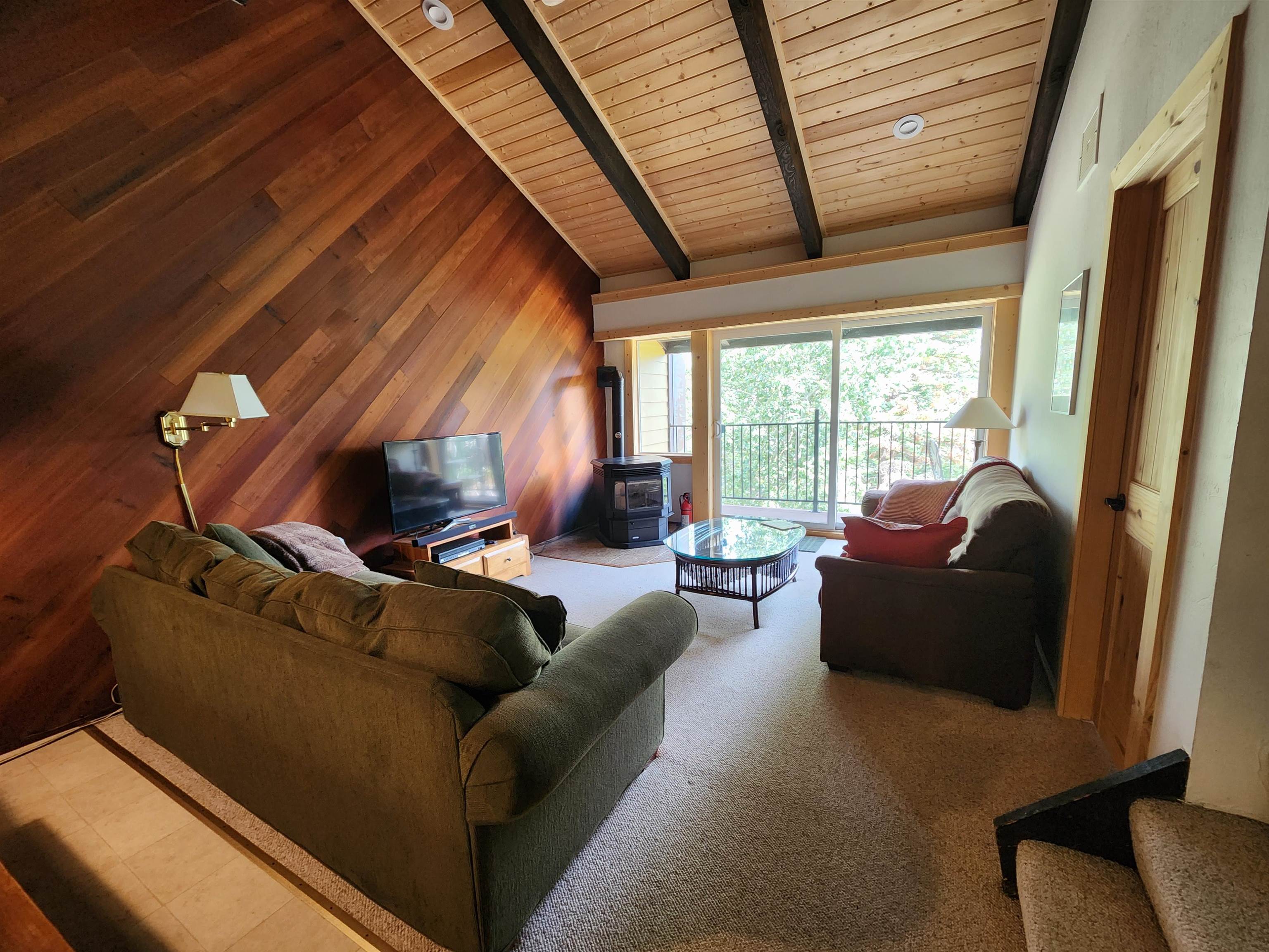 2090 Chalet Road, Unit 2 Alpine Meadows, CA 96146 - Photo 10 of 23 a living room with furniture and a large window