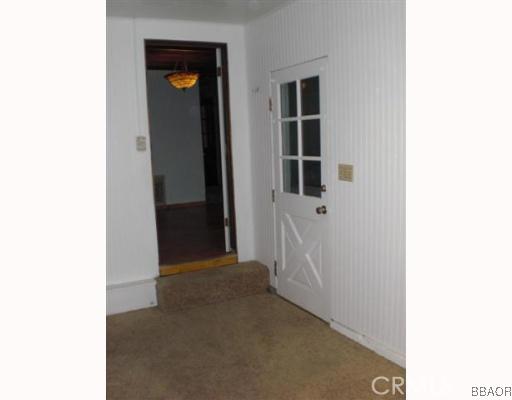 151 Cedar Lane Road Crestline, CA 92325 - Photo 8 of 8 a view of a hallway with wooden floor