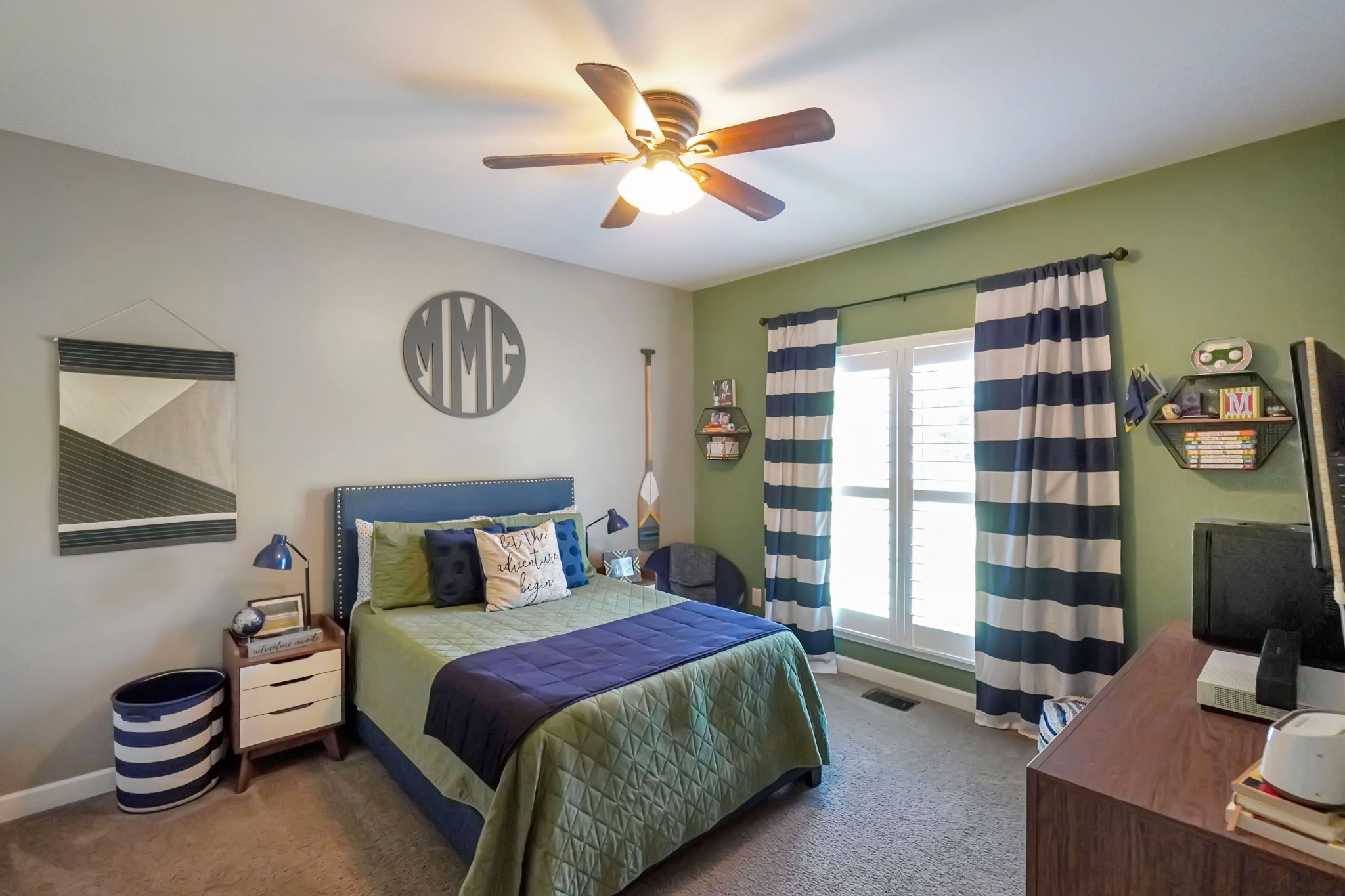 116 Cassandra Drive Cottontown, TN 37048 - Photo 21 of 53 a bedroom with a bed and a chandelier