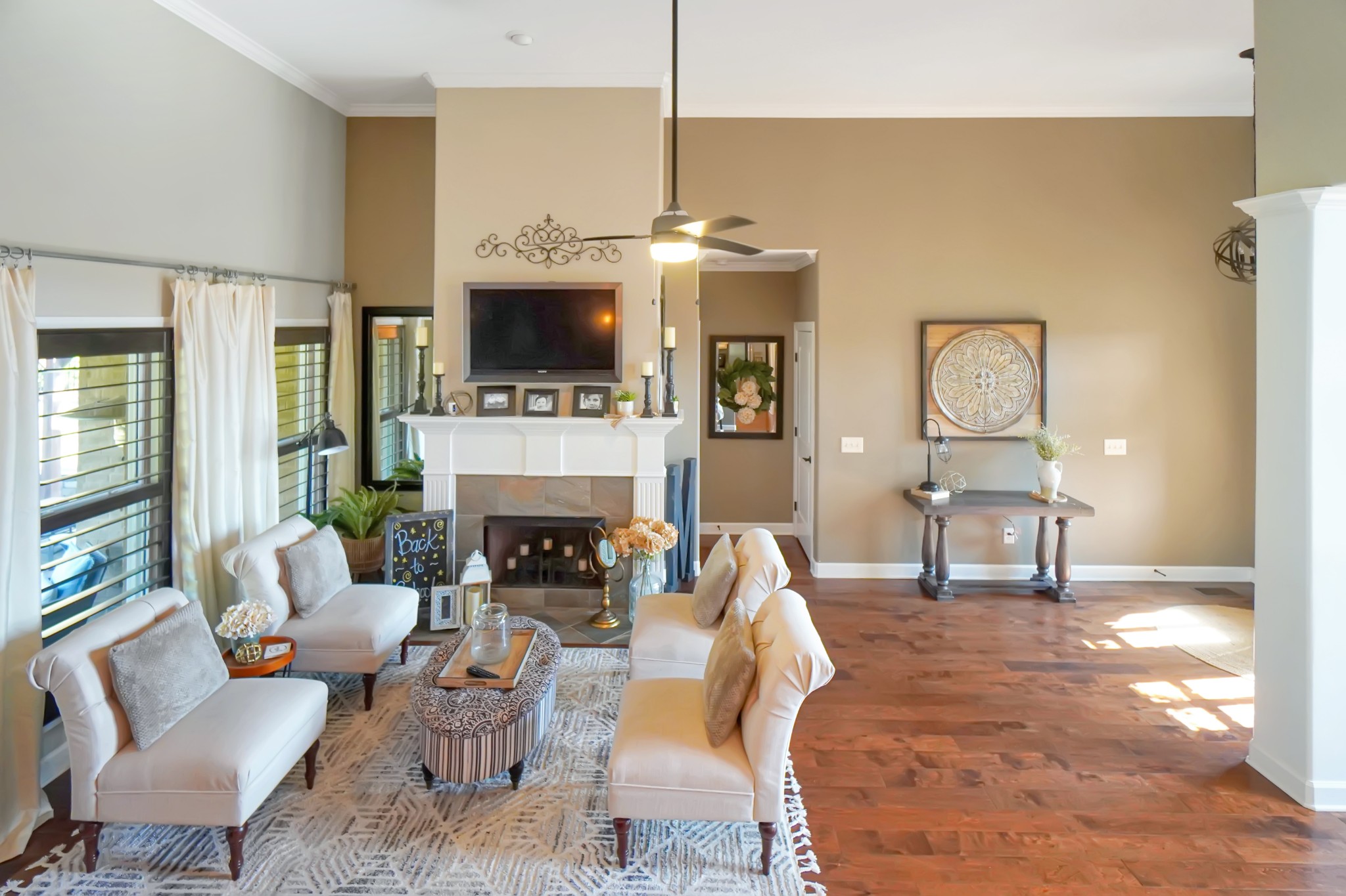 116 Cassandra Drive Cottontown, TN 37048 - Photo 32 of 53 a living room with furniture a fireplace and a flat screen tv