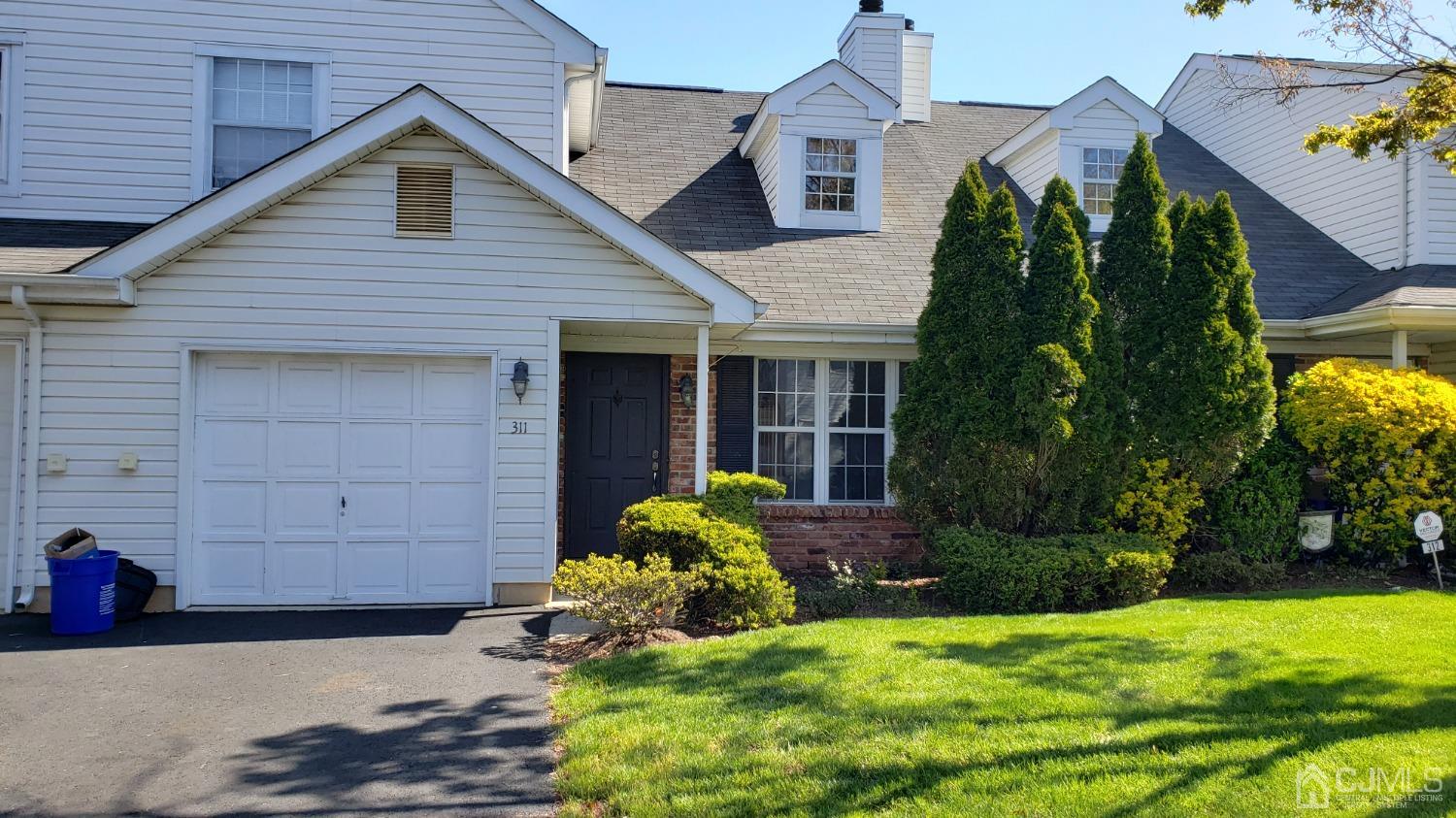 311 Classon Court Somerset, NJ 08873 - Photo 1 of 20 a front view of a house with garden