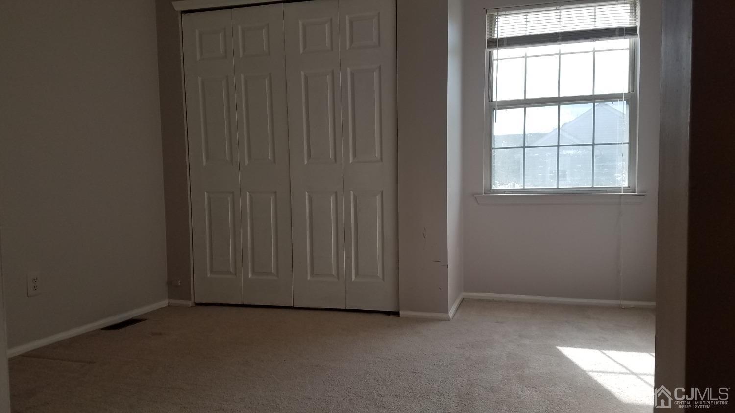311 Classon Court Somerset, NJ 08873 - Photo 18 of 20 an empty room with windows