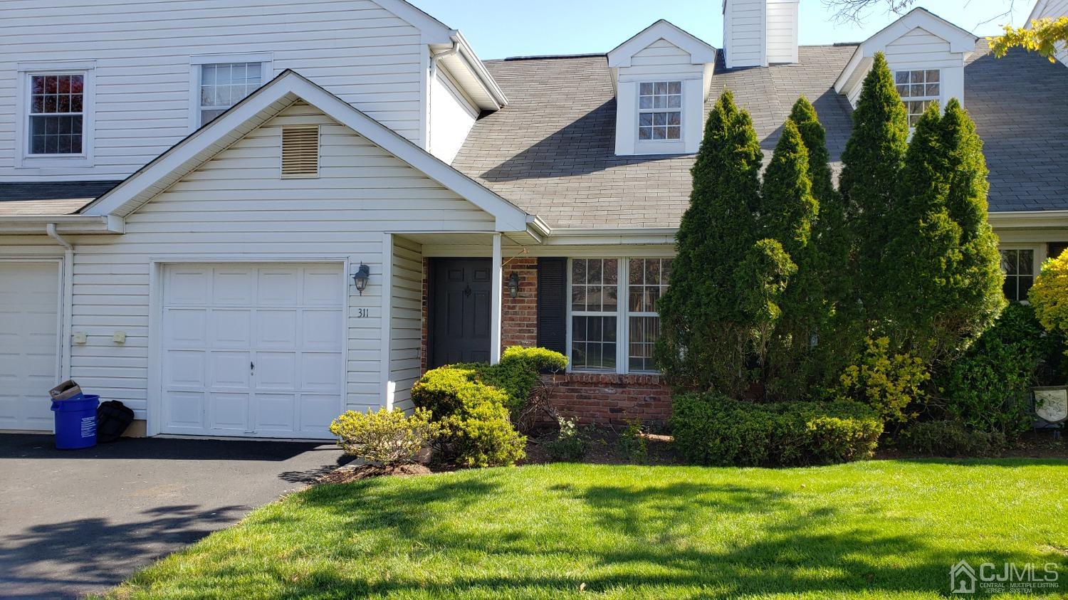 311 Classon Court Somerset, NJ 08873 - Photo 2 of 20 a front view of a house with a yard