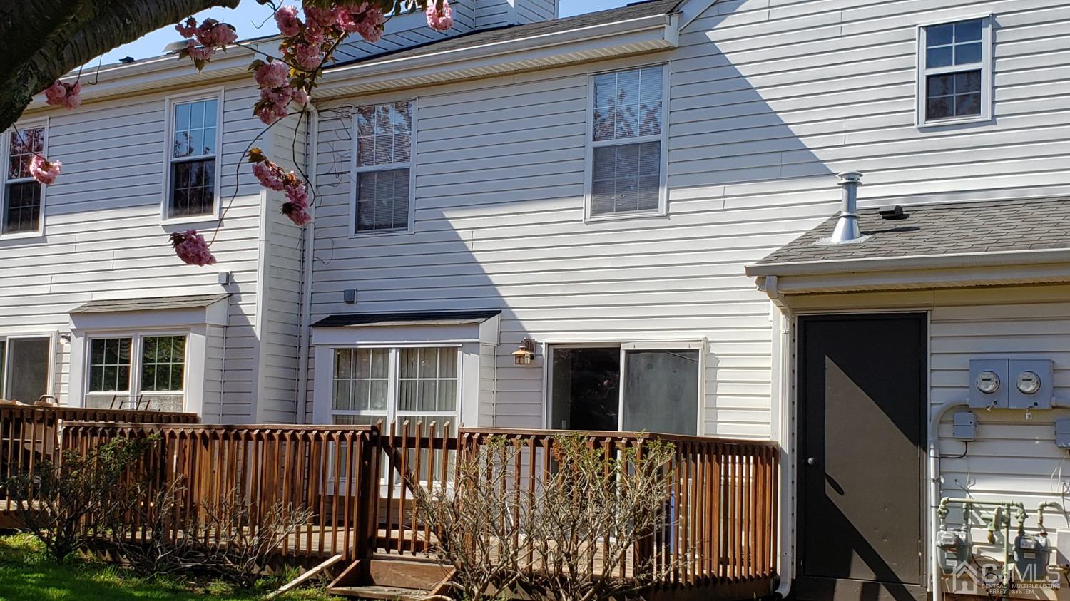 311 Classon Court Somerset, NJ 08873 - Photo 3 of 20 a view of a house with wooden fence