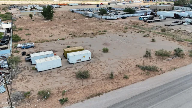 an aerial view of beach space with seating space