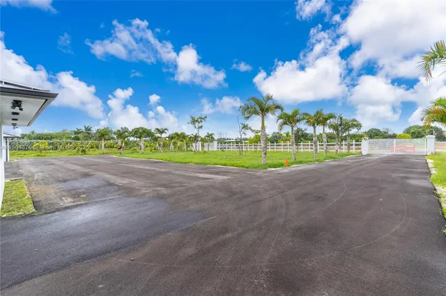 a view of a park with swings and slides