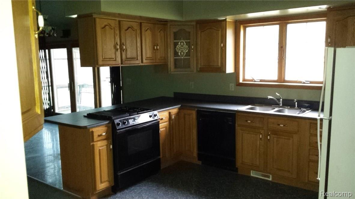 7076 Hewitt Road Jeddo, MI 48032 - Photo 2 of 24 This is a view of the kitchen.