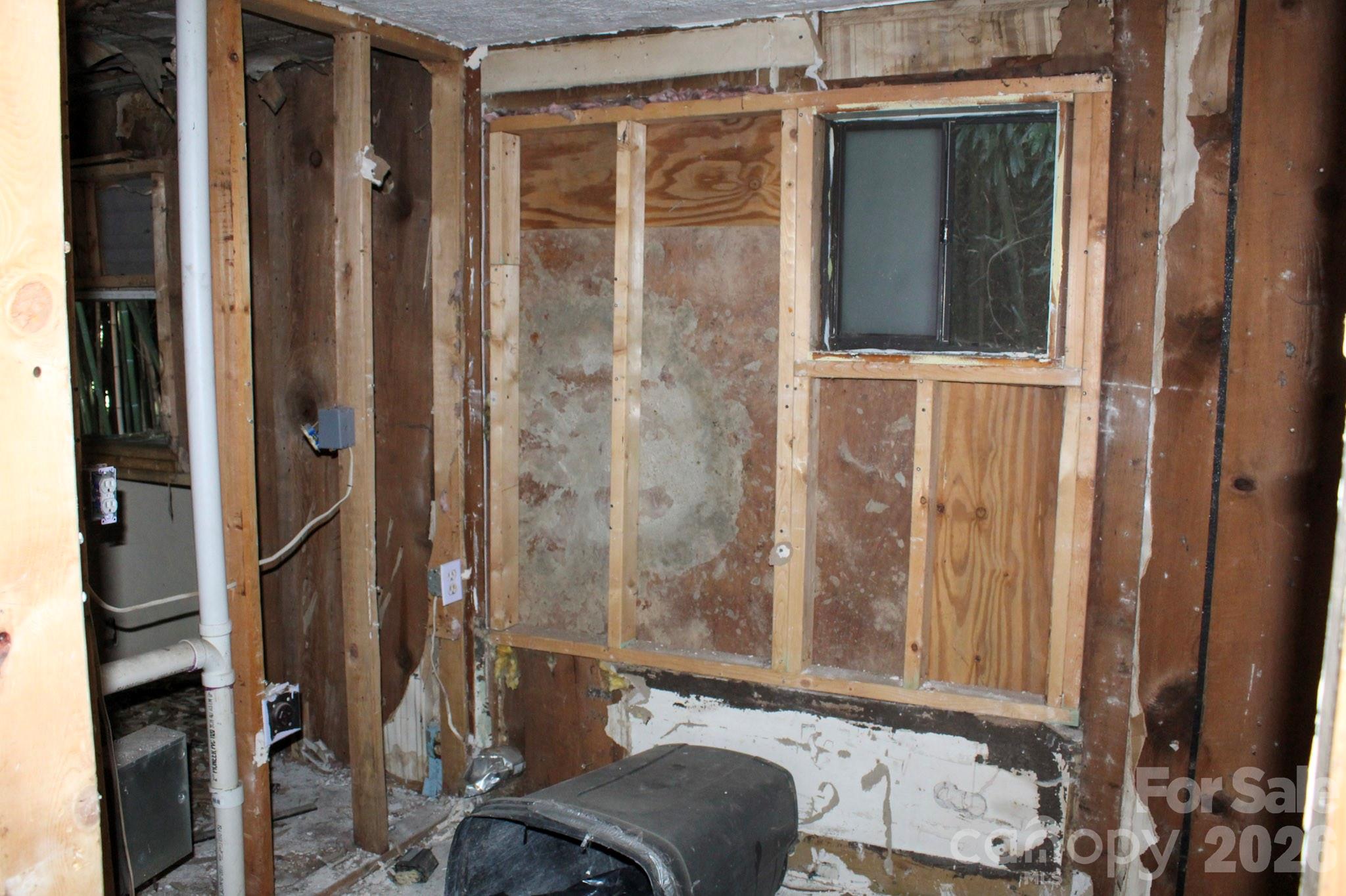1293 Lake Logan Road Canton, NC 28716 - Photo 33 of 48 a bathroom with a granite countertop window and a shower