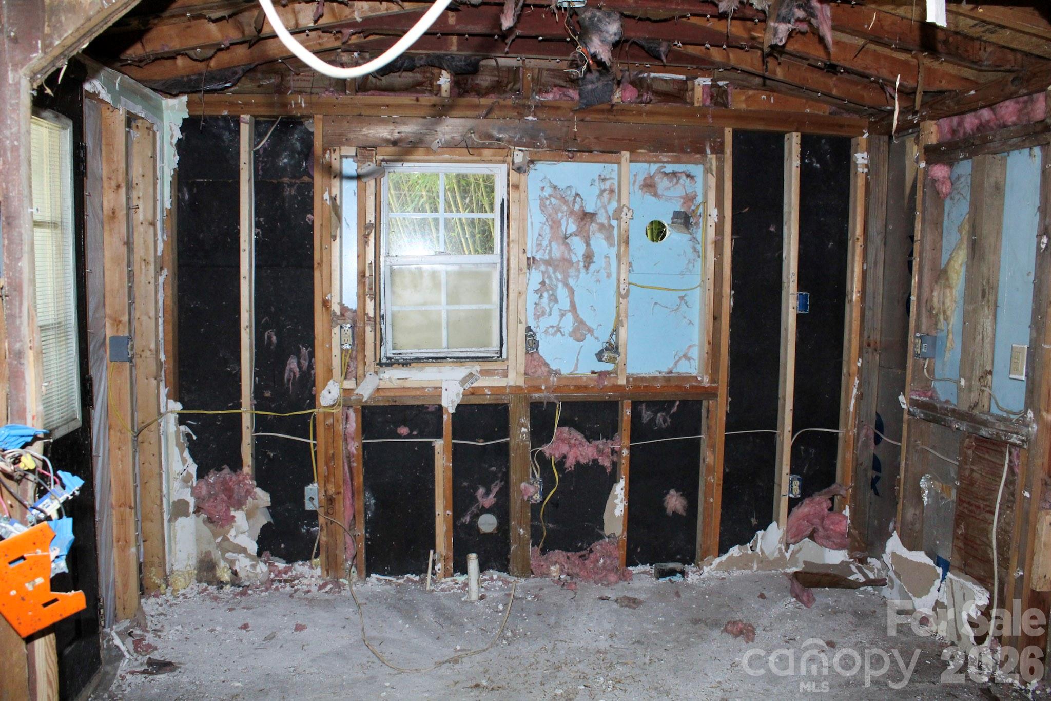 1293 Lake Logan Road Canton, NC 28716 - Photo 36 of 48 a view of a house with a porch