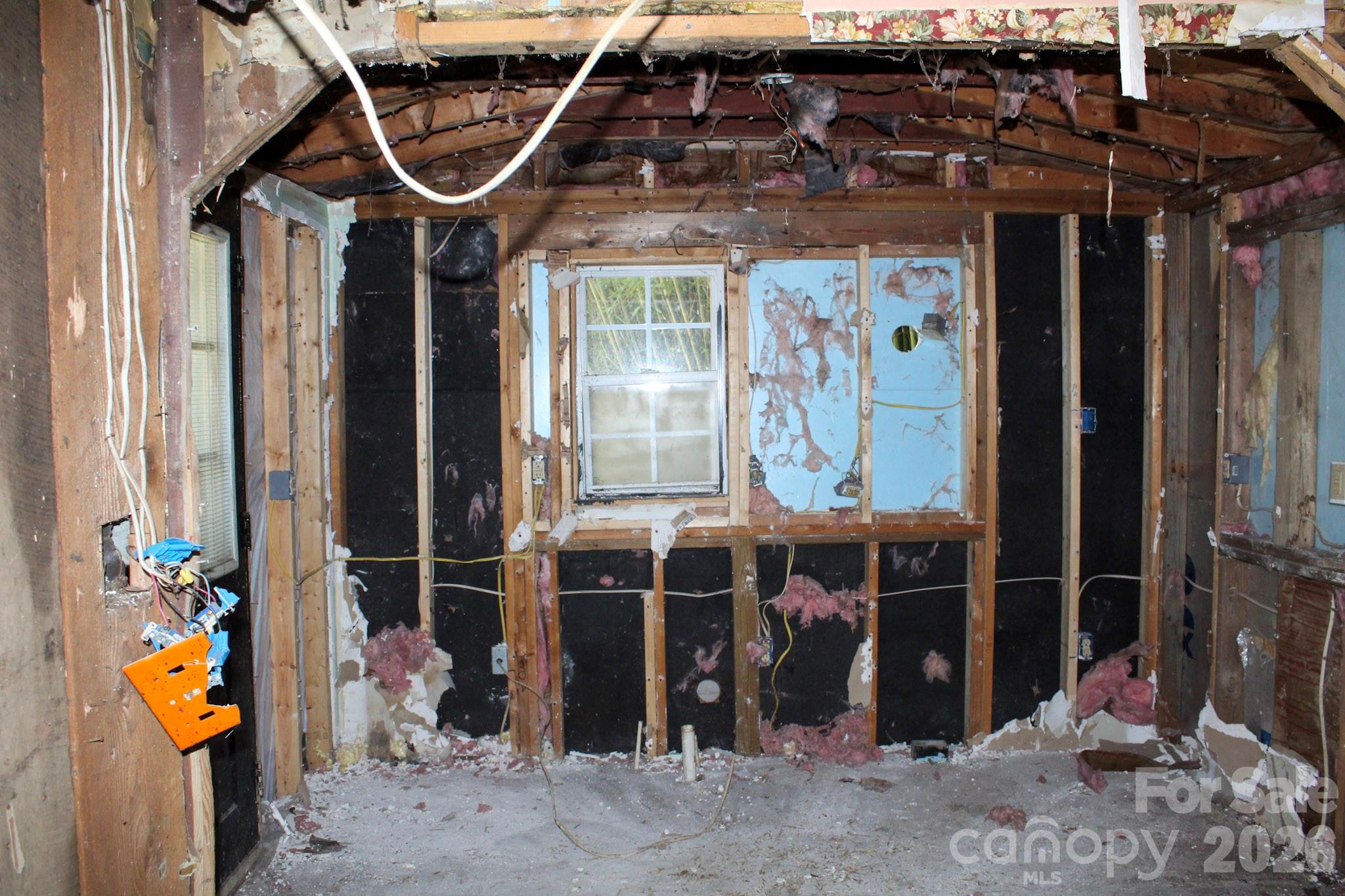 1293 Lake Logan Road Canton, NC 28716 - Photo 37 of 48 a view of an chairs and table in the patio