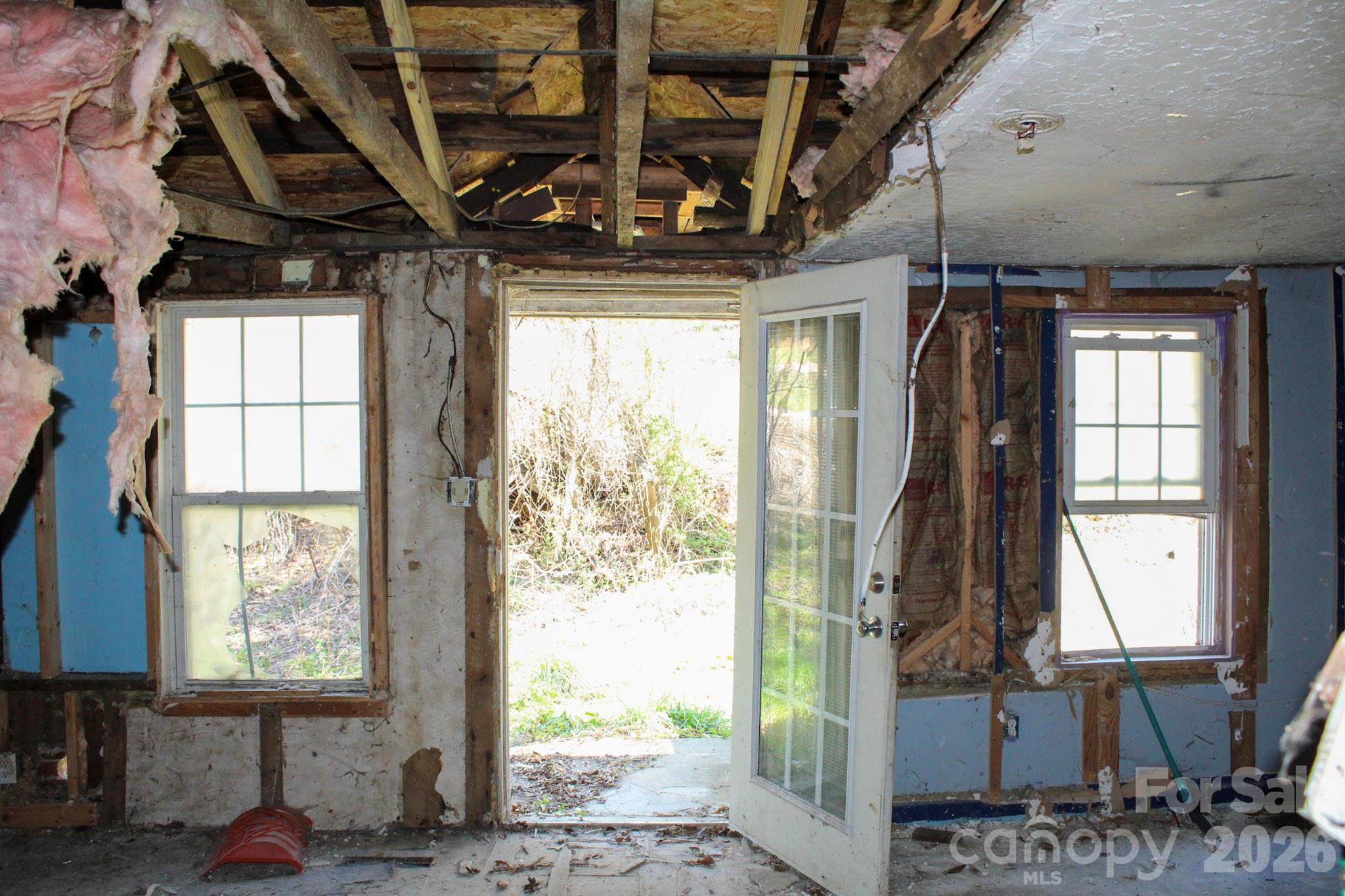1293 Lake Logan Road Canton, NC 28716 - Photo 42 of 48 a front view of a house with a porch