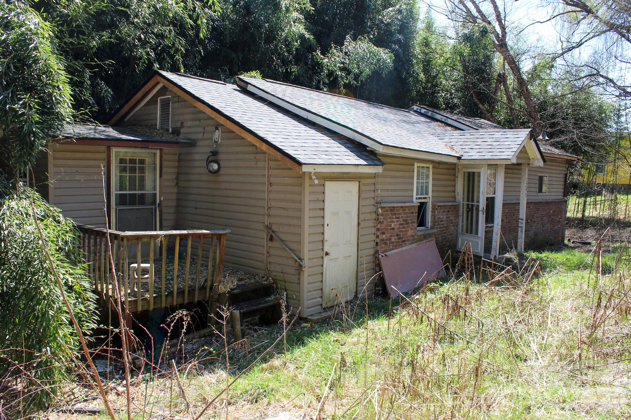 1293 Lake Logan Road Canton, NC 28716 - Photo 44 of 48 a backyard of a house with yard and outdoor seating
