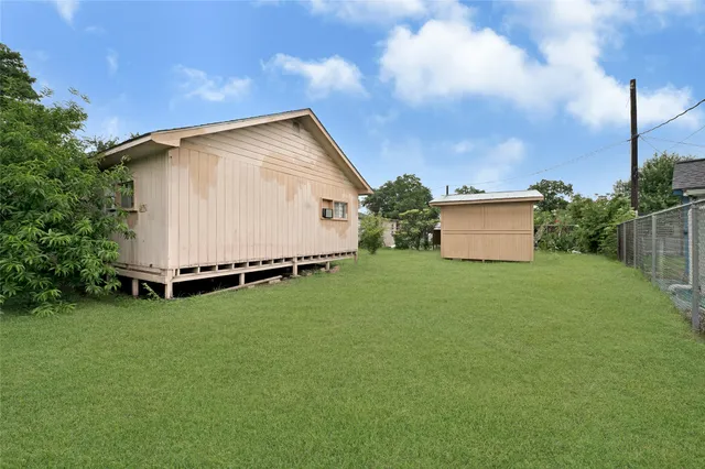 a house view with a garden space