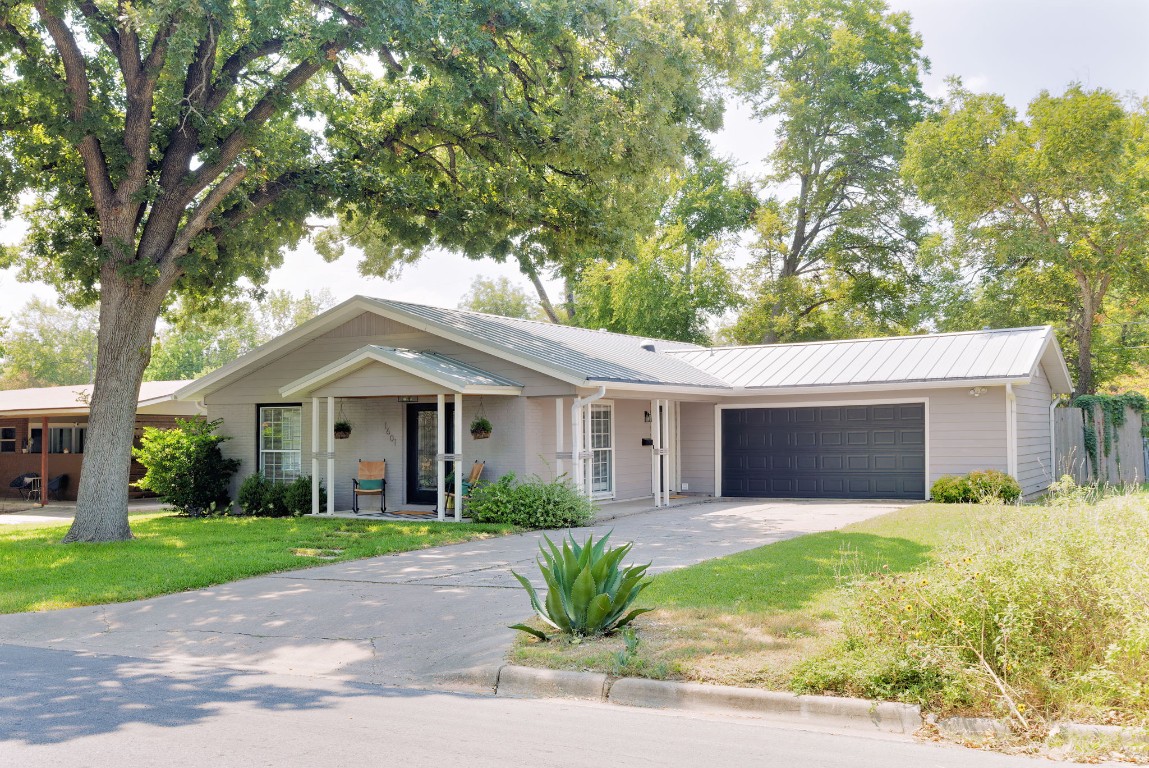 1601 Northridge Drive Austin, TX 78723 - Photo 1 of 40 a front view of house with yard and green space