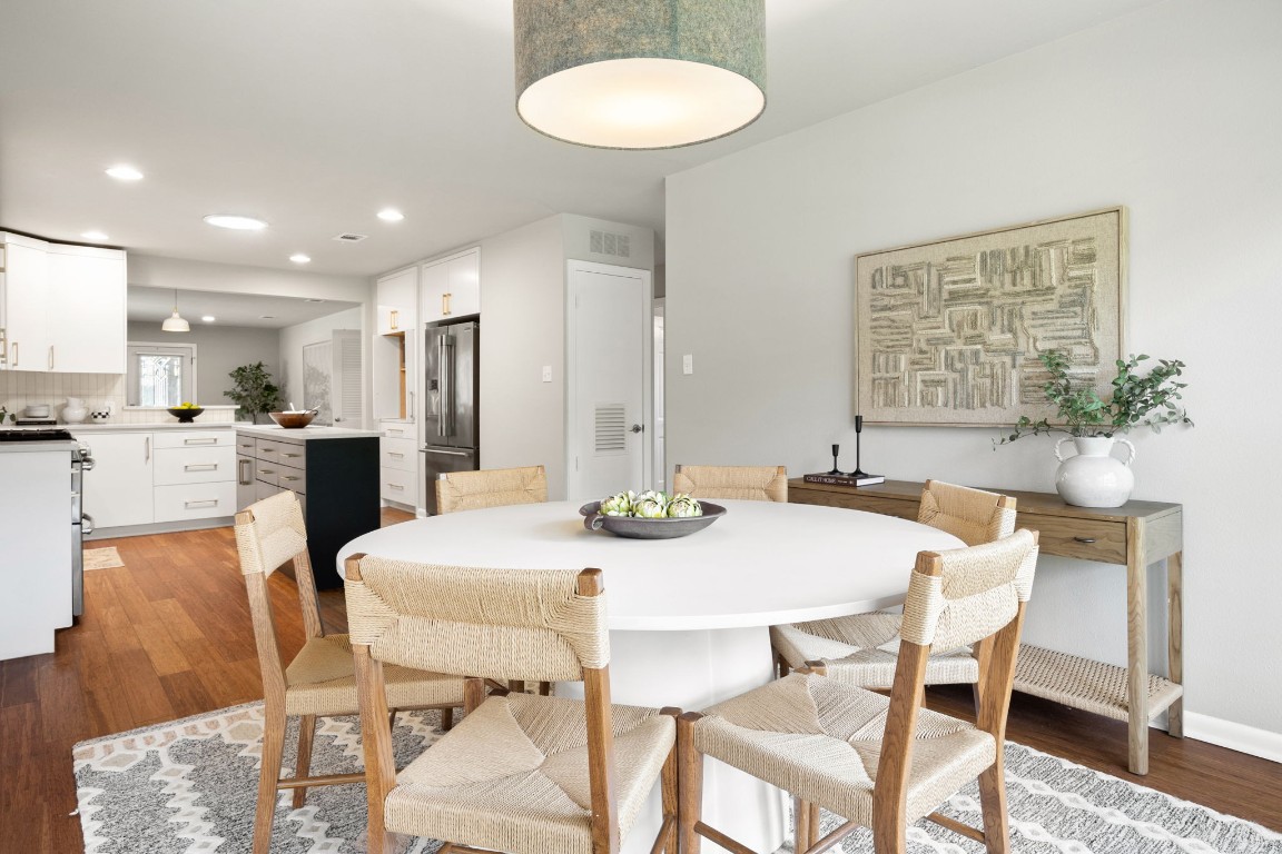 1601 Northridge Drive Austin, TX 78723 - Photo 14 of 40 a view of a dining room with furniture and wooden floor