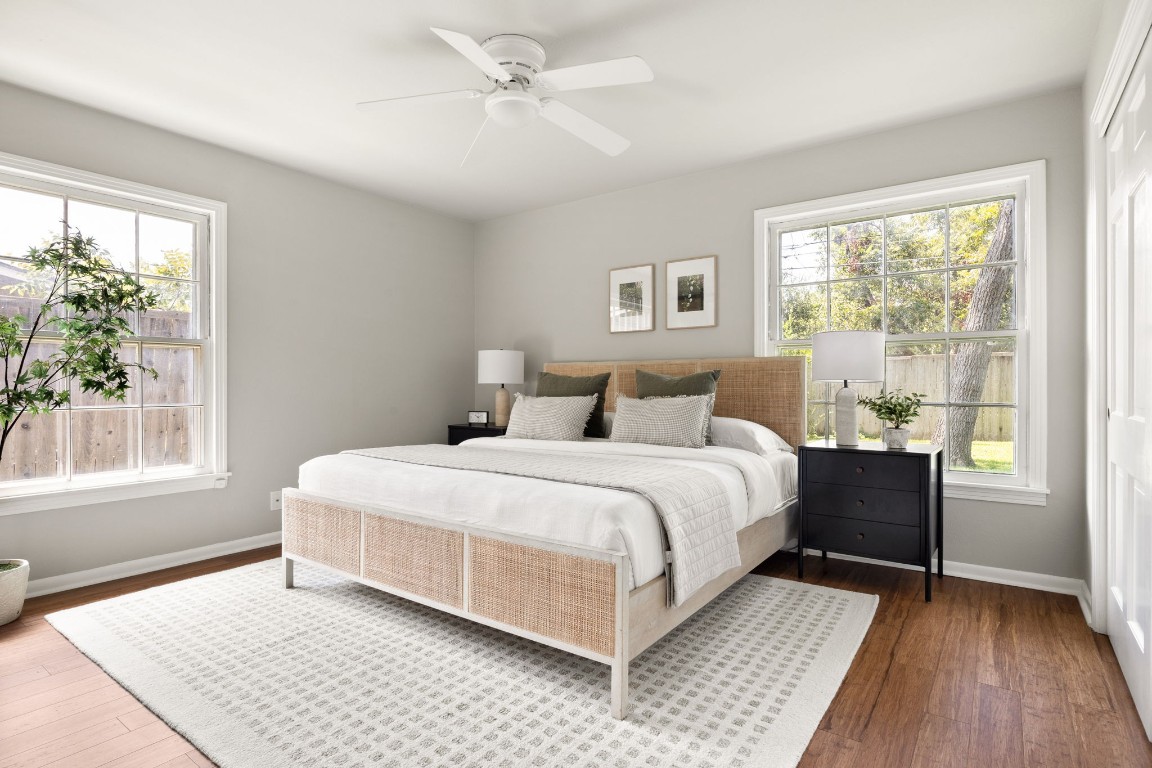 1601 Northridge Drive Austin, TX 78723 - Photo 25 of 40 a bedroom with a large bed and a window