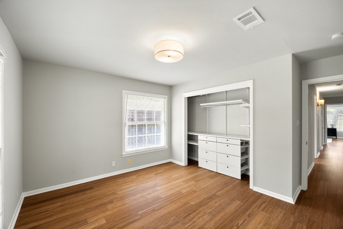 1601 Northridge Drive Austin, TX 78723 - Photo 34 of 40 an empty room with wooden floor and window
