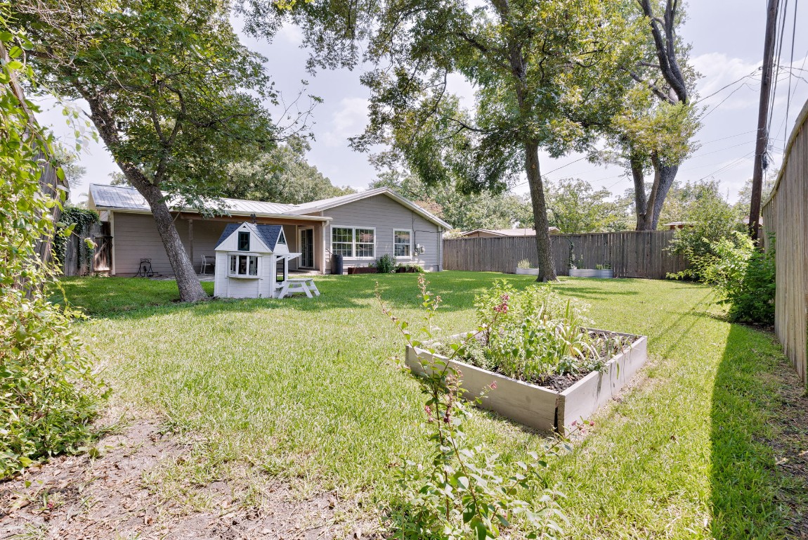 1601 Northridge Drive Austin, TX 78723 - Photo 37 of 40 a front view of a house with garden
