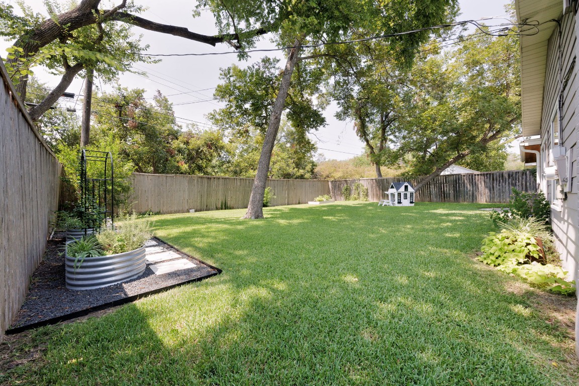 1601 Northridge Drive Austin, TX 78723 - Photo 39 of 40 a view of a backyard with a garden
