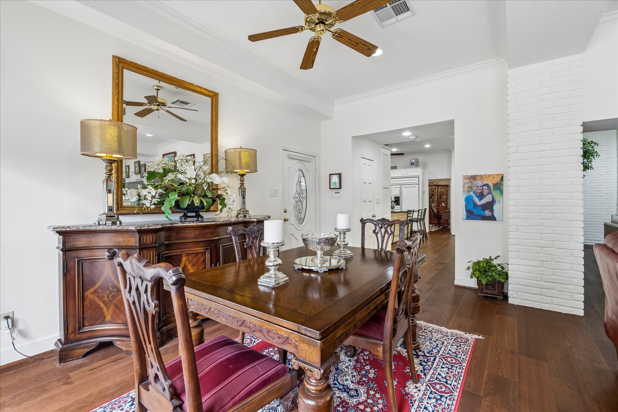 13503 Myrtlea Drive Houston, TX 77079 - Photo 18 of 50 a view of a dining room with furniture and wooden floor