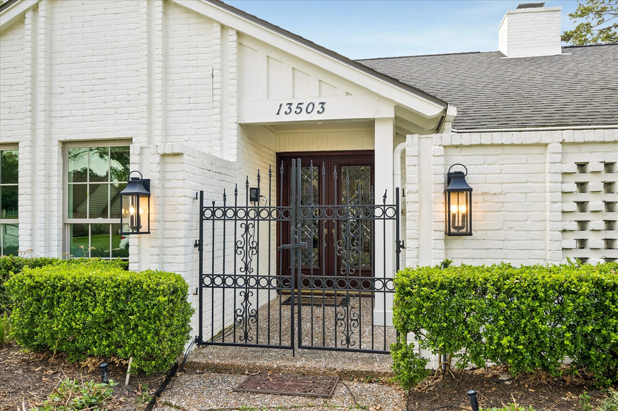 13503 Myrtlea Drive Houston, TX 77079 - Photo 2 of 50 a view of a building with potted plants