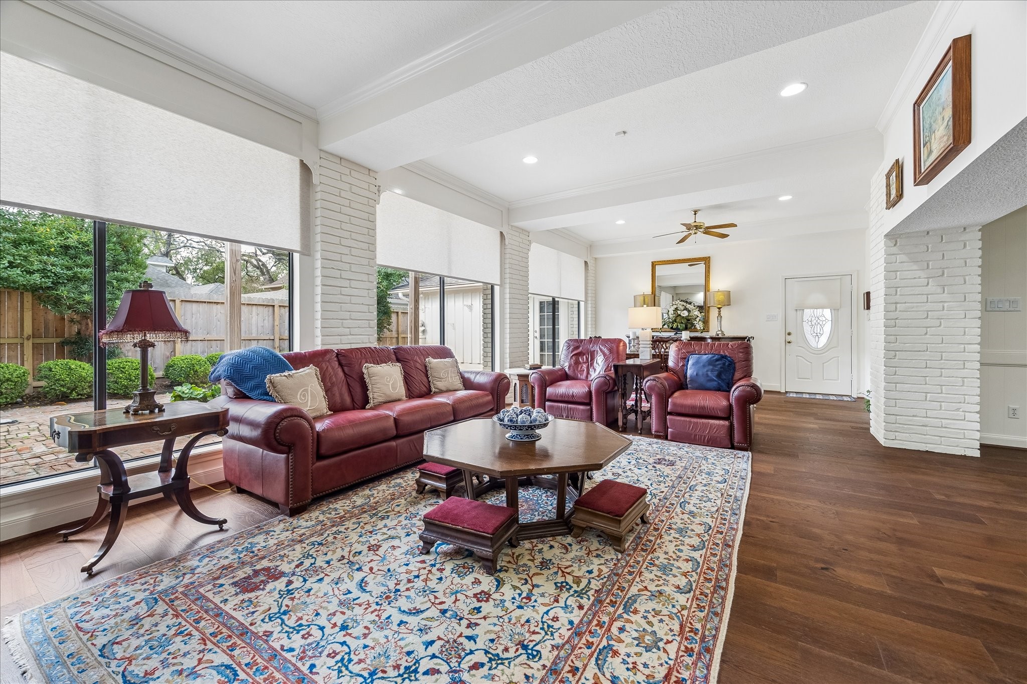 13503 Myrtlea Drive Houston, TX 77079 - Photo 23 of 50 a living room with furniture fireplace and a large window