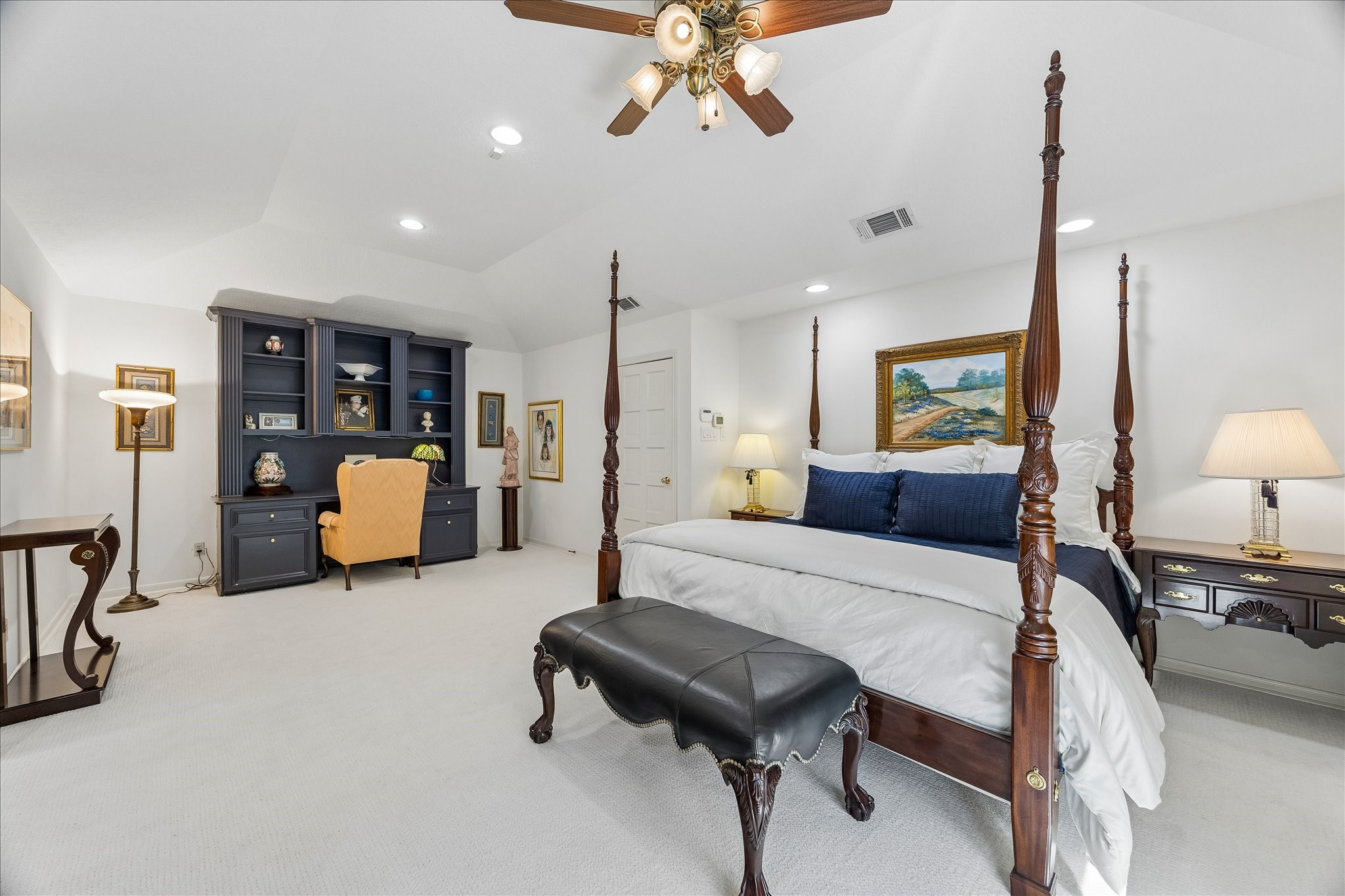 13503 Myrtlea Drive Houston, TX 77079 - Photo 28 of 50 a bedroom with furniture and a chandelier