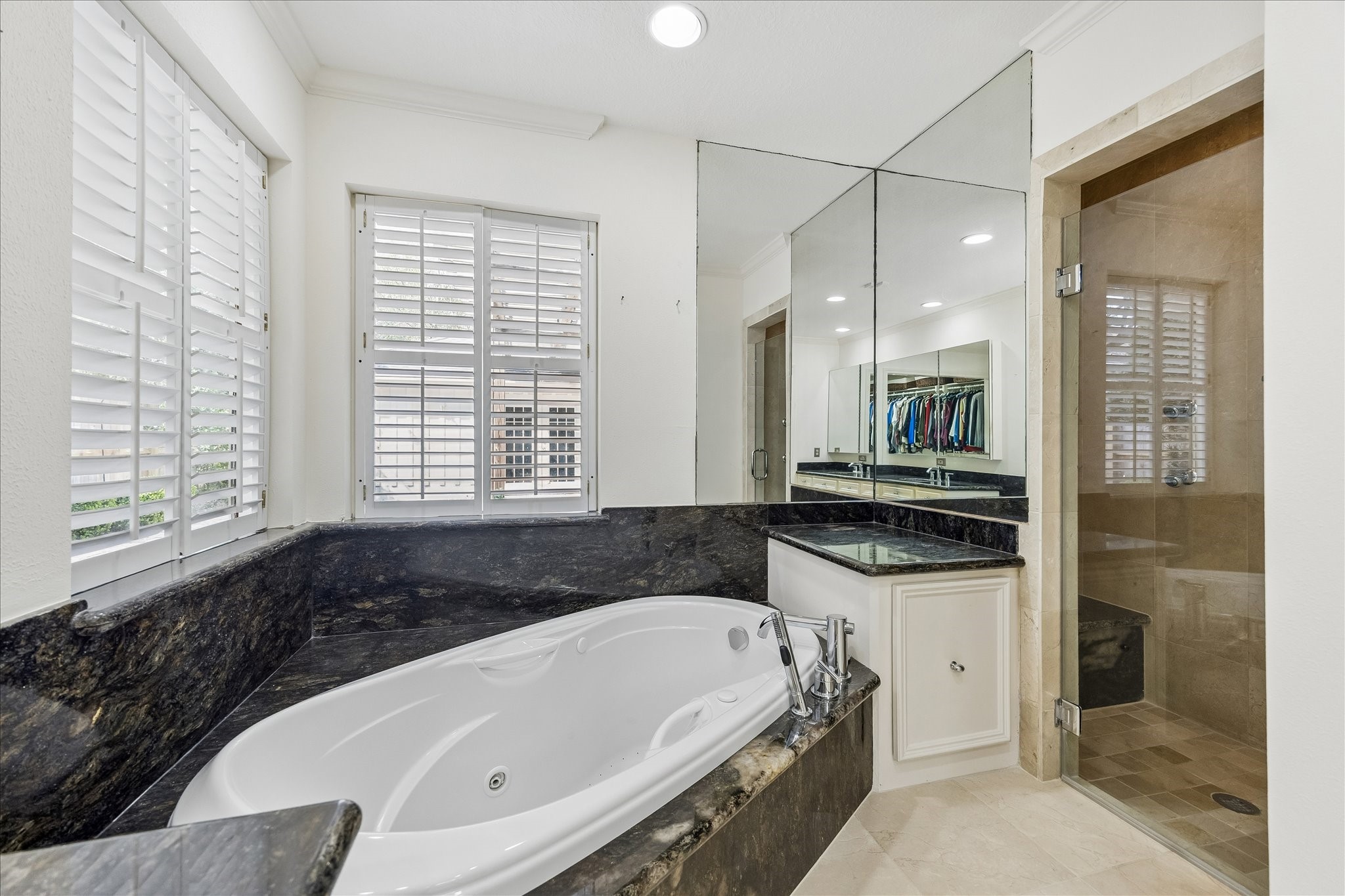 13503 Myrtlea Drive Houston, TX 77079 - Photo 32 of 50 a bathroom with a bathtub and a sink