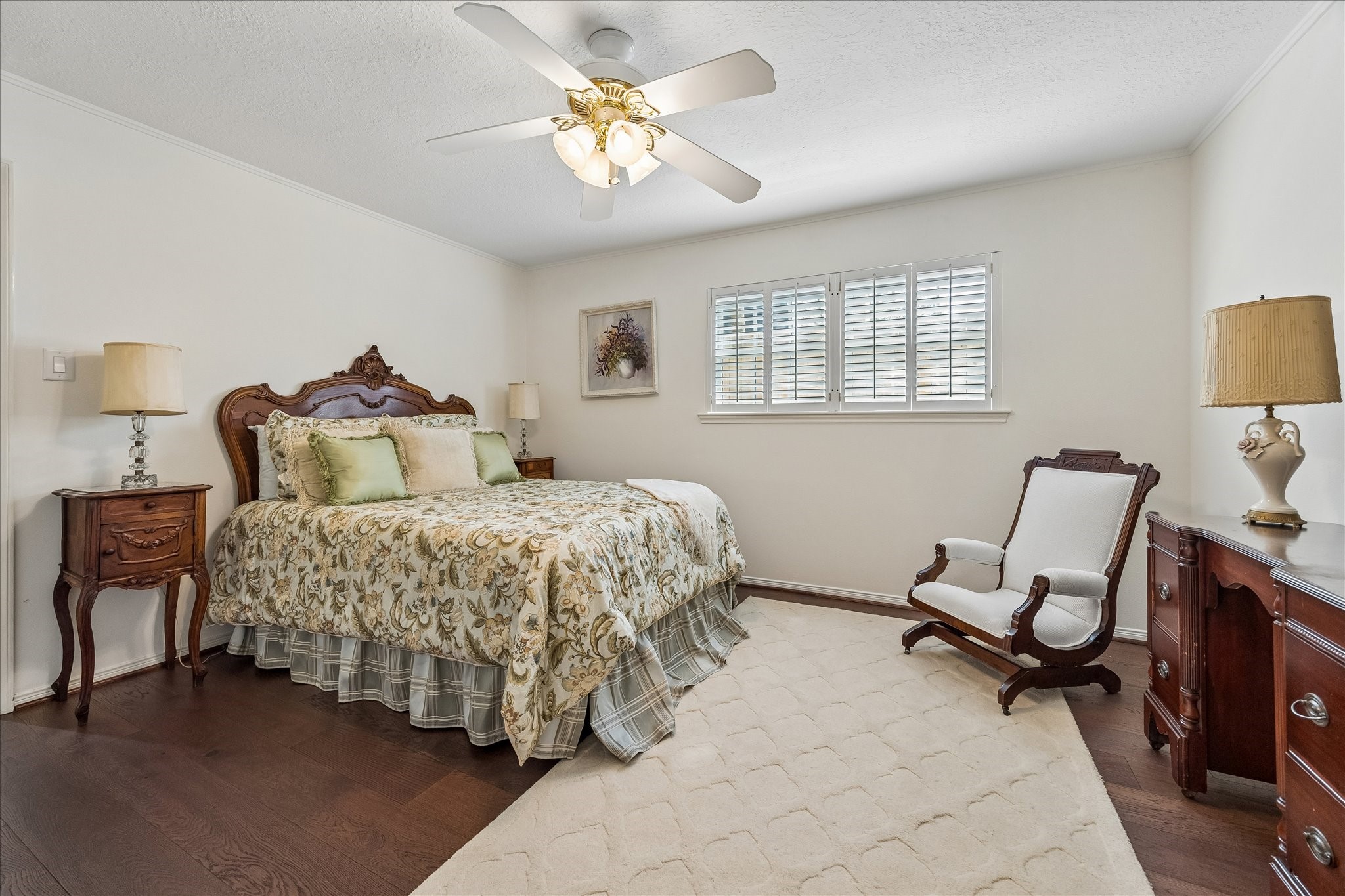 13503 Myrtlea Drive Houston, TX 77079 - Photo 39 of 50 a bedroom with a bed chairs and window