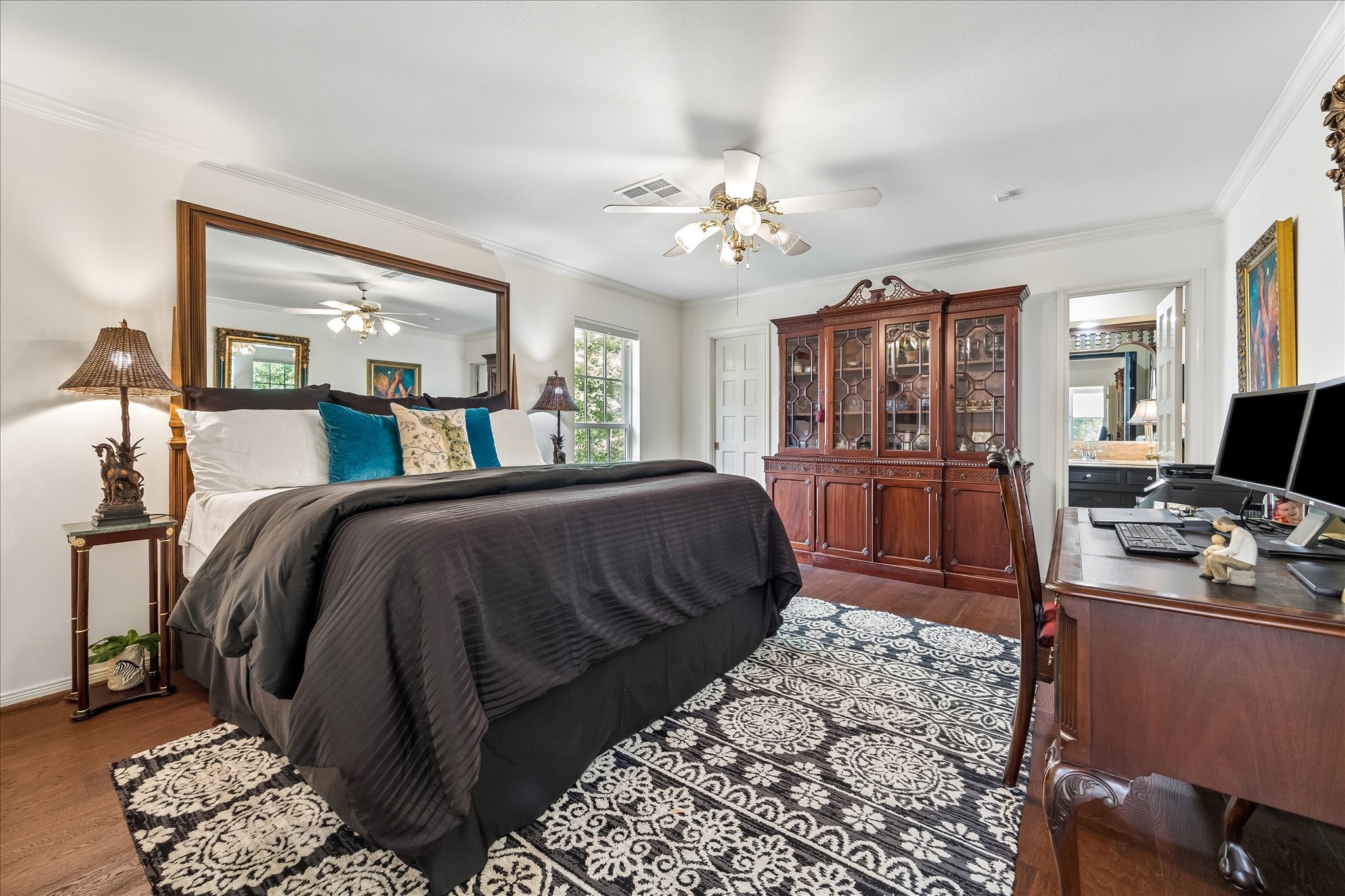 13503 Myrtlea Drive Houston, TX 77079 - Photo 50 of 50 a bedroom with a bed a couch and dresser