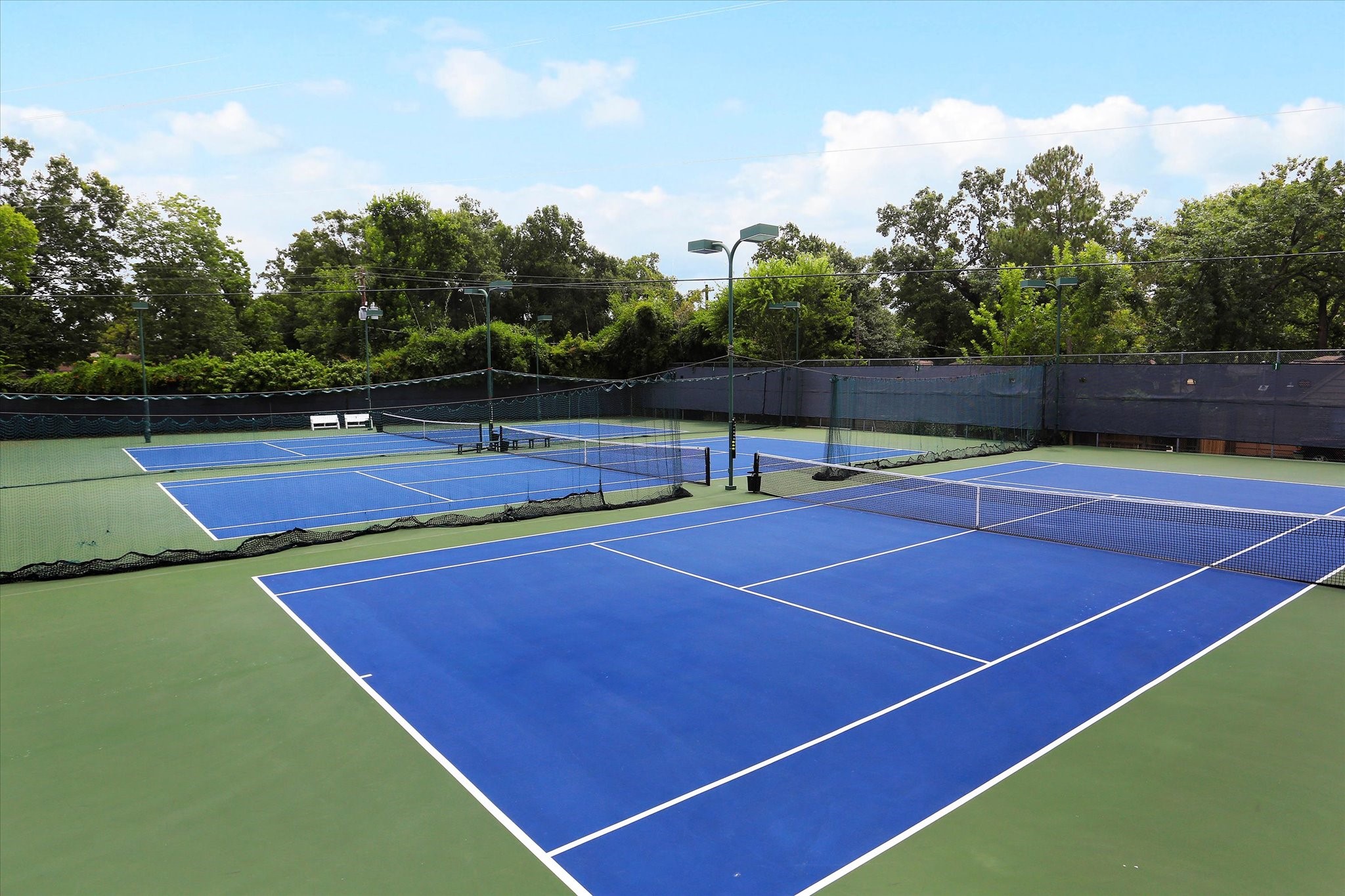 13503 Myrtlea Drive Houston, TX 77079 - Photo 46 of 50 a tennis court that has tennis net