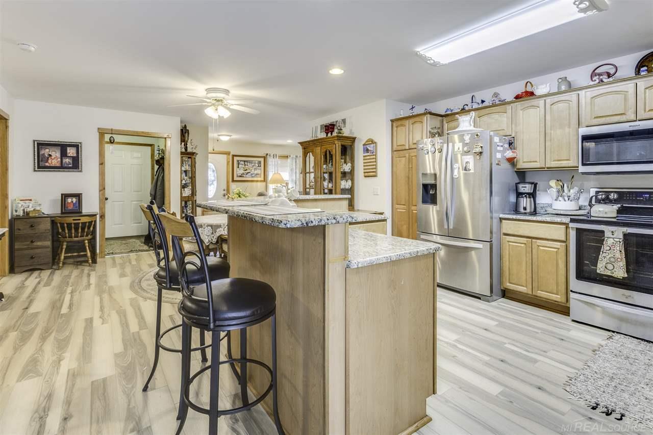7353 Joy Road Lexington, MI 48450 - Photo 12 of 32 Kitchen Island with Bar Seating