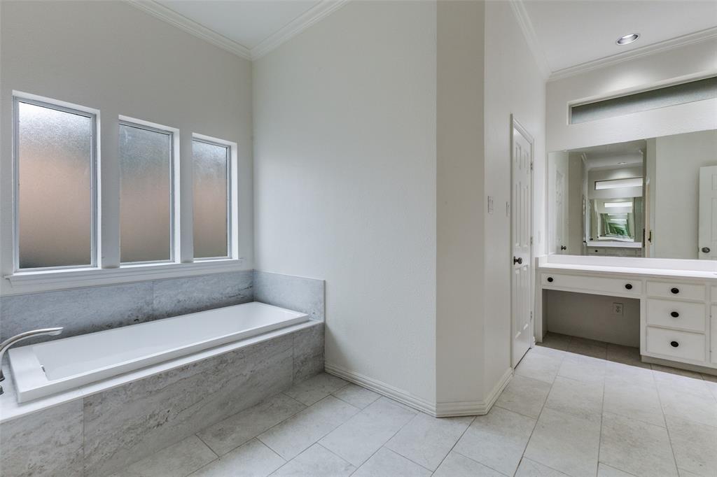17101 Vista Tree Circle Dallas, TX 75248 - Photo 14 of 22 Primary Bath with Garden Tub and quartz countertops
