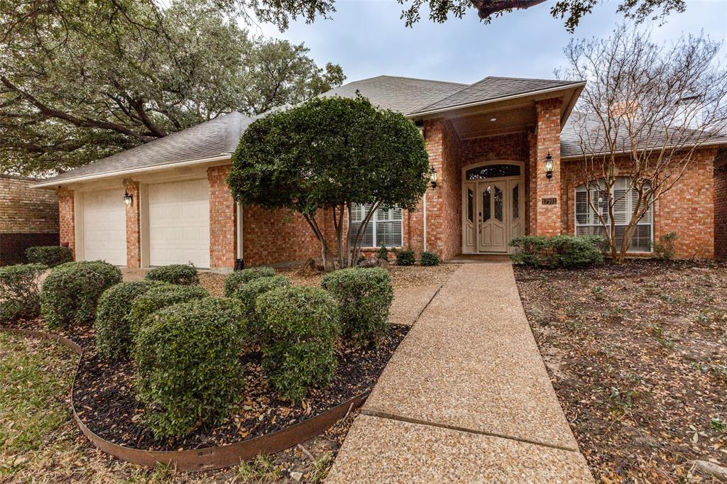 17101 Vista Tree Circle Dallas, TX 75248 - Photo 2 of 22 Mature Live Oaks frame the stunning drive up appeal