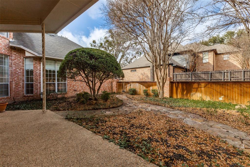 17101 Vista Tree Circle Dallas, TX 75248 - Photo 22 of 22 a view of a house with a yard