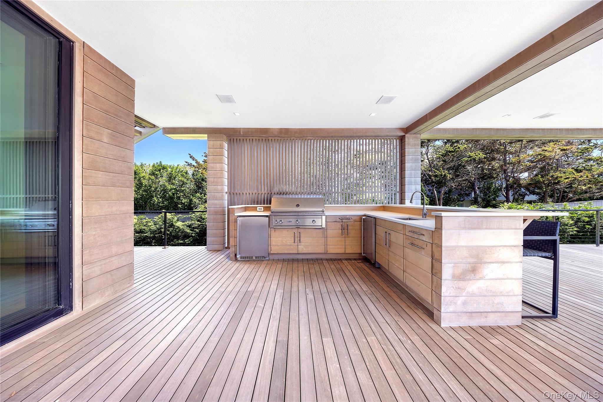 345 Dune Road Westhampton Beach, NY 11978 - Photo 10 of 34 Deck with an outdoor kitchen and a sink