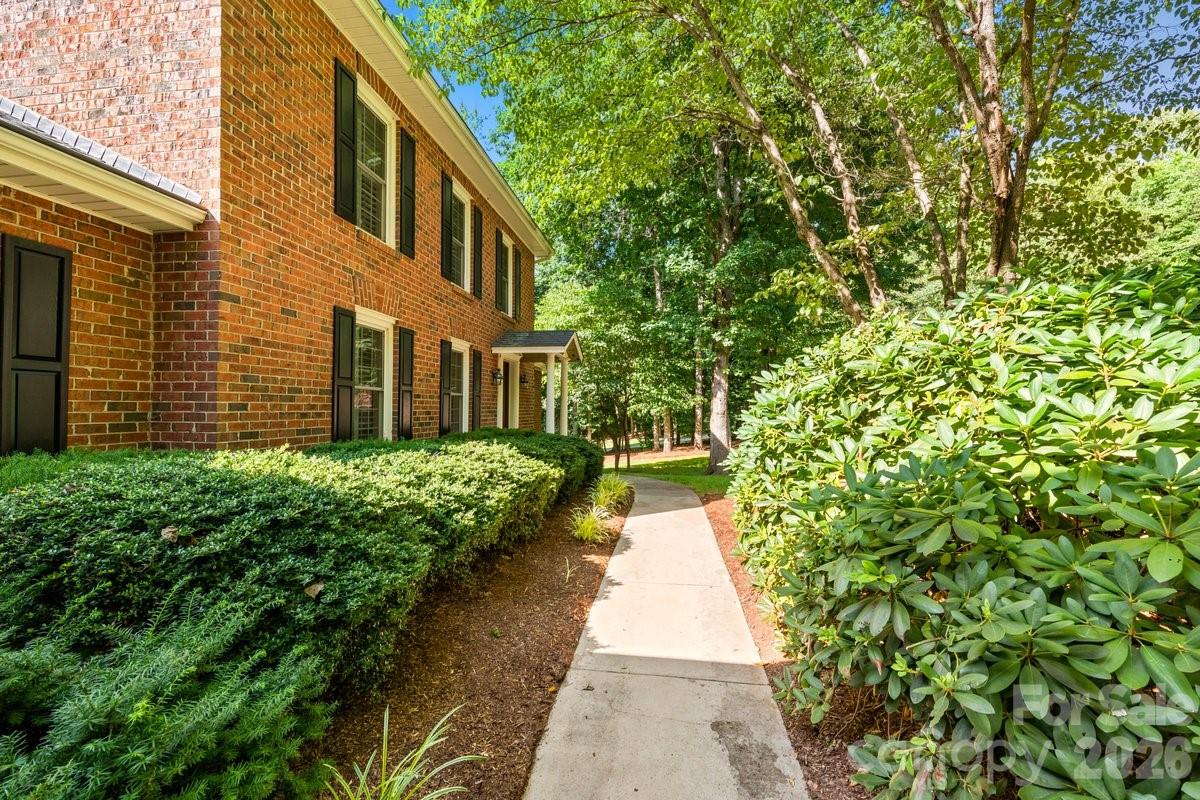 207 Lost Corner Road Morganton, NC 28655 - Photo 4 of 46 a view of a pathway with a house in the background