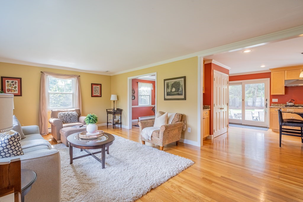 35 Saddle Club Road Lexington, MA 02420 - Photo 3 of 42 a living room with furniture a rug a lamp and a window