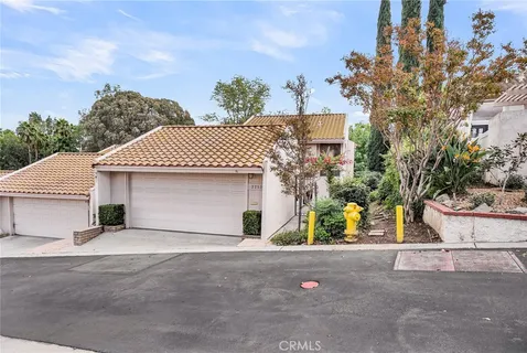 front view of a house with a street